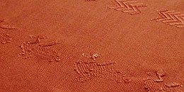 オレンジ色の縫取り織り