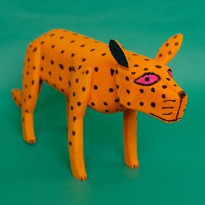 オレンジ犬 置物